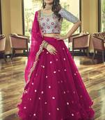 Magenta embroidered net semi stitched lehenga