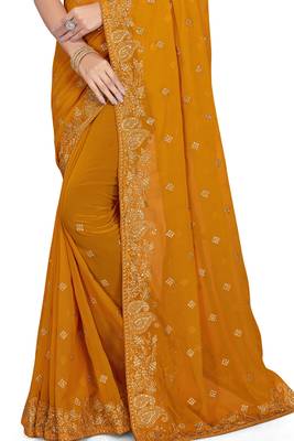 Mustard embroidered georgette saree with blouse 3