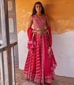 Pink Overlap Heavy Bustier With Kali Skirt And  Dupatta