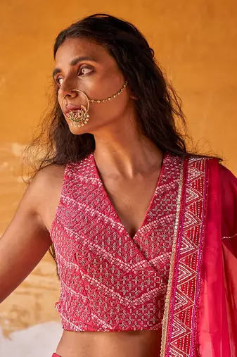 Pink Overlap Heavy Bustier With Kali Skirt And  Dupatta