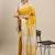 Yellow plain raw silk saree with blouse