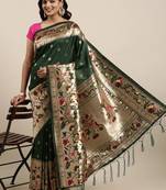 Dark green woven Banarasi silk blend saree with blouse