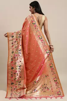 Peach woven Banarasi silk blend saree with blouse