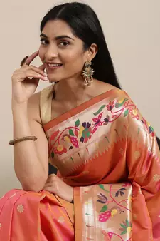 Peach woven Banarasi silk blend saree with blouse