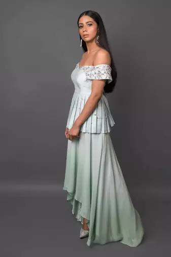 Aqua Off Shoulder Peplum Top With High-Low Skirt.