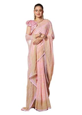 Pink woven georgette saree with blouse 1