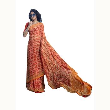 Orange woven georgette saree with blouse 1
