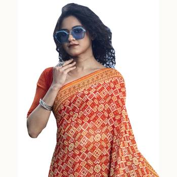 Orange woven georgette saree with blouse 2