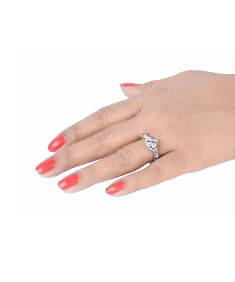 Heart Shaped Solitaire With Baguettes On Either Side