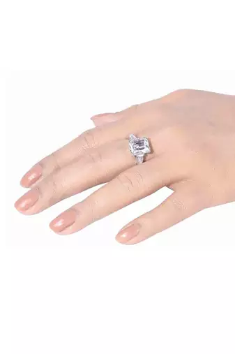 Emerald Cut Solitaire With Baguettes On Either Side