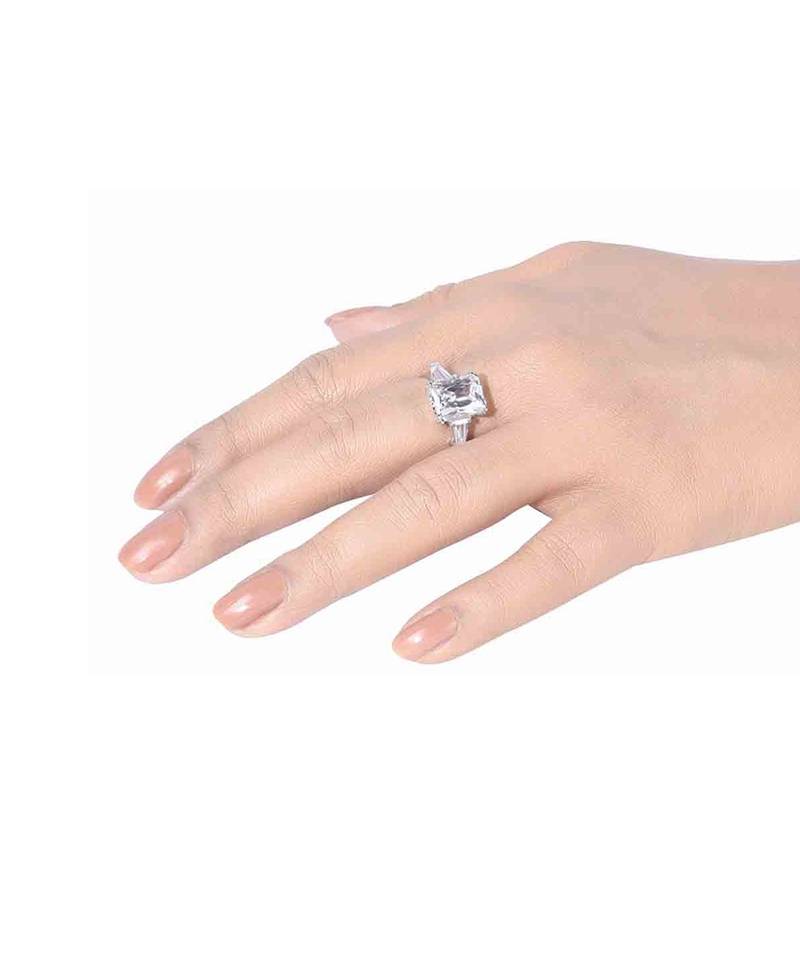 Emerald Cut Solitaire With Baguettes On Either Side