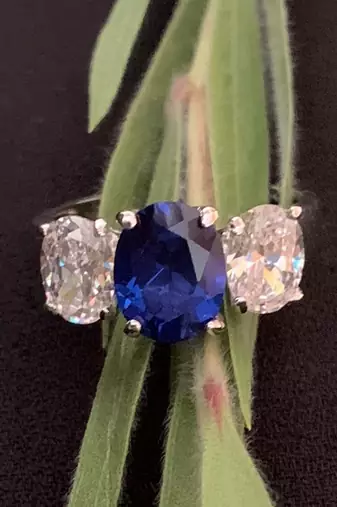 Oval Blue Center With 2 Oval Shaped Diamonds On Either Side