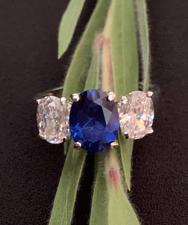 Oval Blue Center With 2 Oval Shaped Diamonds On Either Side