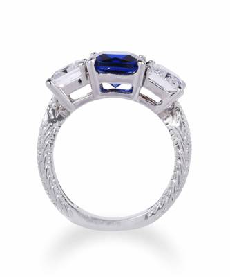 Blue Sapphire Center With Emerald Cut Diamonds On Either Side 1