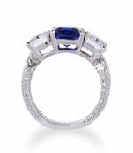 Blue Sapphire Center With Emerald Cut Diamonds On Either Side