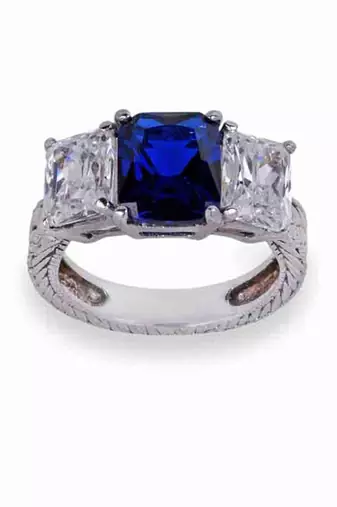 Blue Sapphire Center With Emerald Cut Diamonds On Either Side