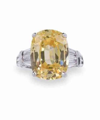 Radiant Cut Yellow Sapphire With Baguettes On Either Side 2