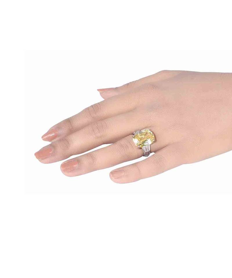Radiant Cut Yellow Sapphire With Baguettes On Either Side