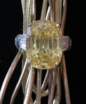 Radiant Cut Yellow Sapphire With Baguettes On Either Side 4