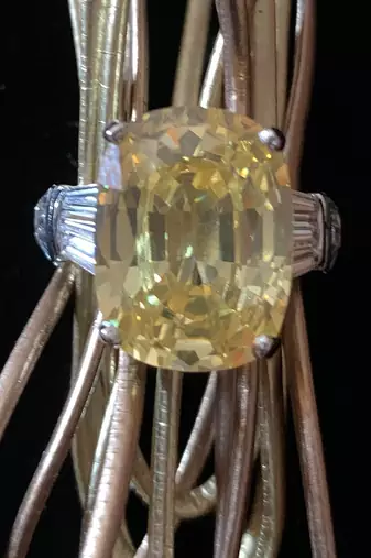 Radiant Cut Yellow Sapphire With Baguettes On Either Side