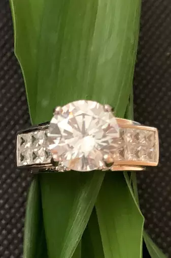 Round Classic Solitaire With Elevated Diamond Band
