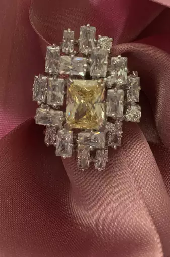 Yellow Center With Uneven Setting Of Diamond Cluster