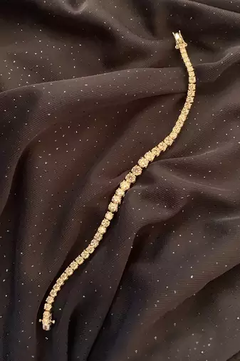 Graded Round Solitaire Tennis Bracelet