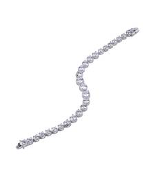 Graded Solitaire Tennis Bracelet With Ribbed Halo