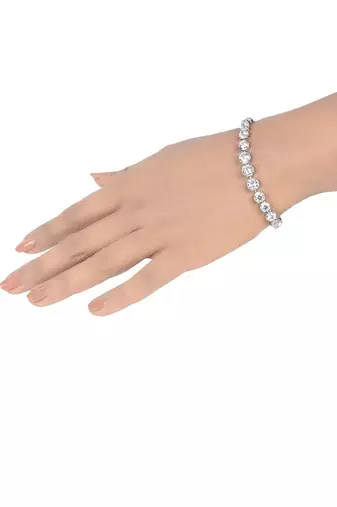 Graded Solitaire Tennis Bracelet With Ribbed Halo