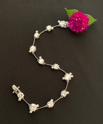 Round Solitaire With Small Stones Attached - Tennis Bracelet 4