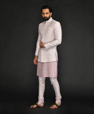 Powder Pink Silk Mirror Textured  Bandhgala With Plain Kurta And Slim Pants. 2