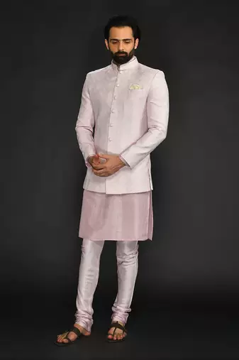 Powder Pink Silk Mirror Textured  Bandhgala With Plain Kurta And Slim Pants.
