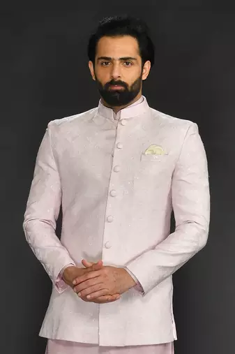 Powder Pink Silk Mirror Textured  Bandhgala With Plain Kurta And Slim Pants.