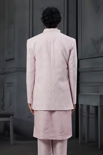 Powder Pink Silk Mirror Textured Front Open Bandhgala With Plain Kurta And Slim Pants.