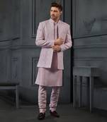 Powder Pink Silk Mirror Textured Front Open Bandhgala With Plain Kurta And Slim Pants.