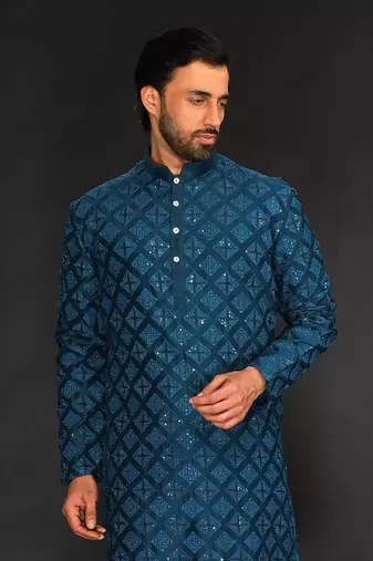 Teal Blue Pure Chanderi Machine Textured Embroidered Kurta Paired With Chudidar