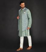 Dull Mint Green Imported Velvet Printed Long Bundi Paired With Vis. Silk Kurta And Spun Silk Chudidar.