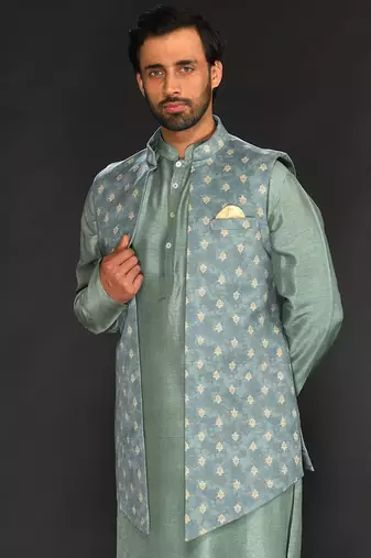 Dull Mint Green Imported Velvet Printed Long Bundi Paired With Vis. Silk Kurta And Spun Silk Chudidar.