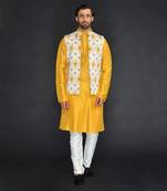 Off White Poly. Khadi Textured Printed Bundi With Musterd Vis. Silk Kurta Paired With Off White Spun Cotton Chudidar.