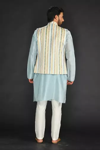 Off White Imported Russian Printed Bundi With Vis. Silk  Kurta Paired With Off White Spun Silk Chudidar.