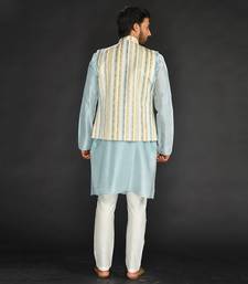 Off White Imported Russian Printed Bundi With Vis. Silk  Kurta Paired With Off White Spun Silk Chudidar.