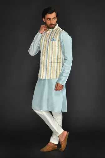 Off White Imported Russian Printed Bundi With Vis. Silk  Kurta Paired With Off White Spun Silk Chudidar.
