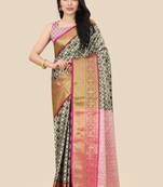 Green woven banarasi saree with blouse