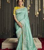 Sea green embroidered silk saree with blouse