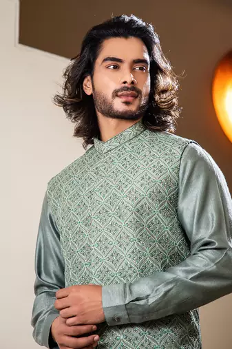 Sage Green Hand Embroidered Jacket With Asymmetric Draped Kurta Set.