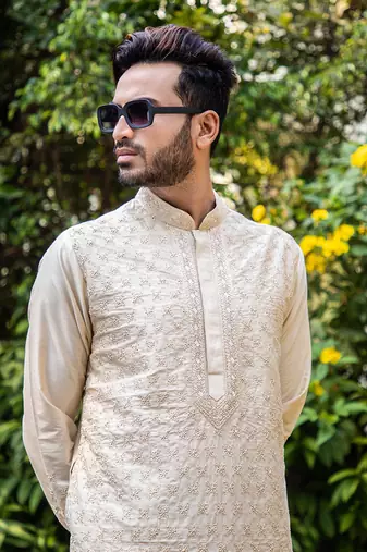Beige Hand Embroidered Kurta Set.