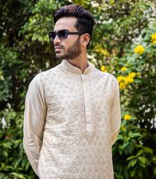 Beige Hand Embroidered Kurta Set.