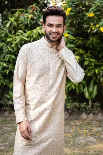 Beige Hand Embroidered Kurta Set.