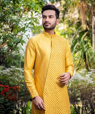 Mustard Embroidered Diagonal Cut Kurta With Pants. 2