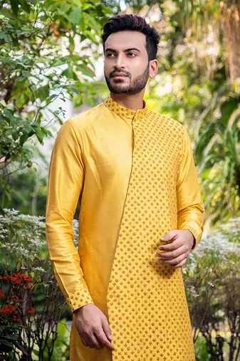 Mustard Embroidered Diagonal Cut Kurta With Pants.
